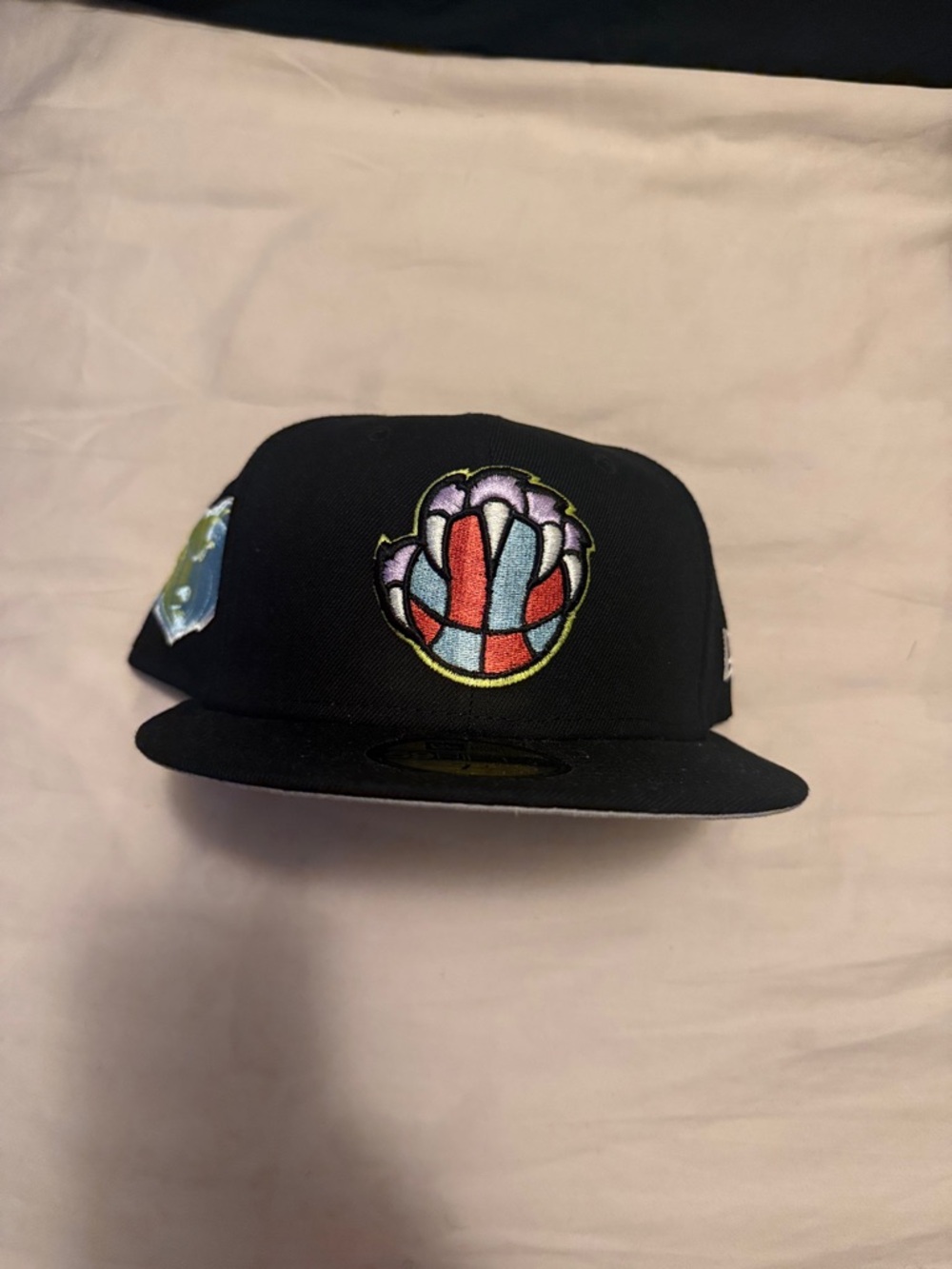 Black Snapback Hat with Multicolor Embroidered Patch